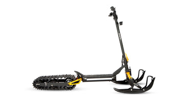 Side view of the ICEX 1.0 stand-up snow scooter with front skis and rear track – electric snowmobile